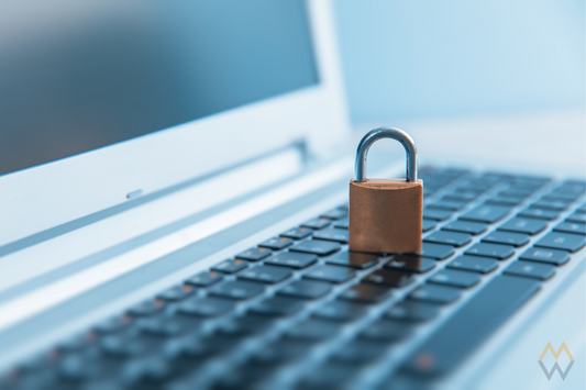 A lock on top of a laptop keyboard